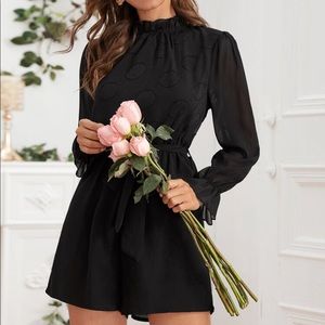 Brand new black romper